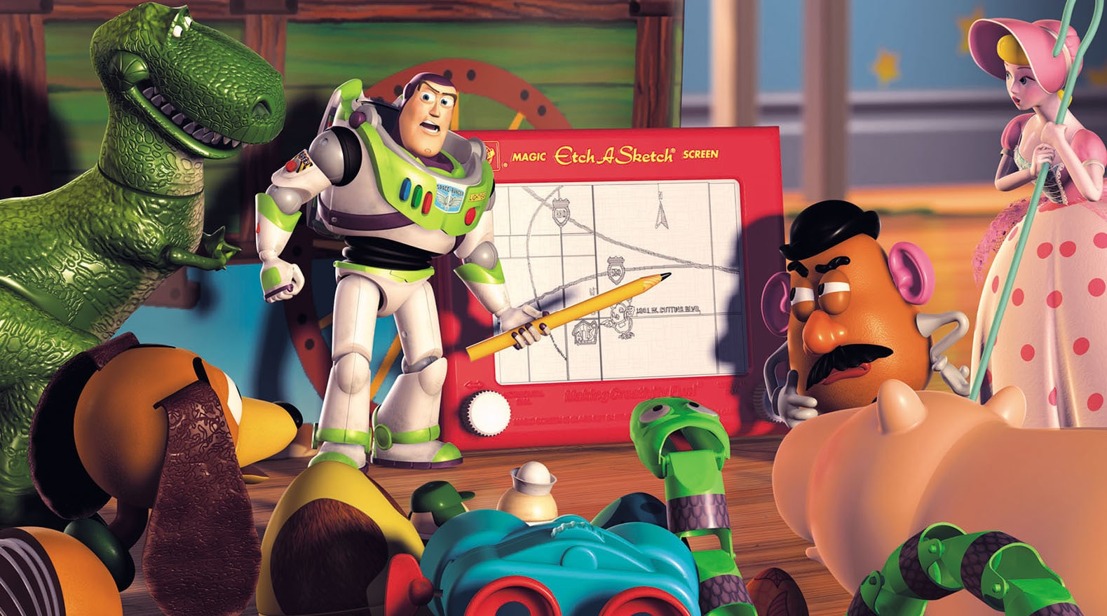 A still from Toy Story 2 - Buzz Lightyear addresses the other toys from in front of an Etch-a-Sketch he is using as a whiteboard.